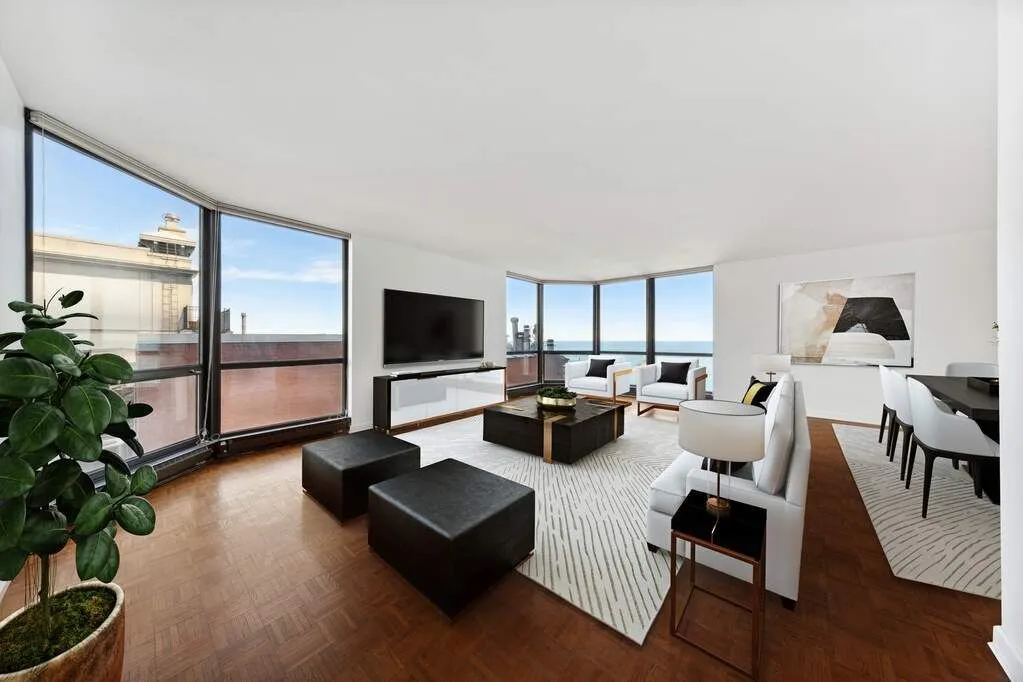 990 N Lake Shore Drive #15D, Chicago — living room with floor-to-ceiling windows over Lake Michigan and the skyline